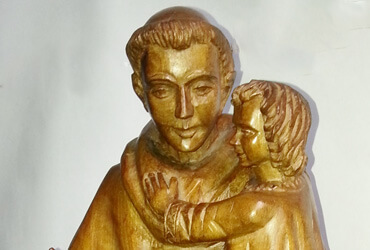 Aurelio Rodríguez - San Antonio con niño. | Dimensiones: 44 cms alto. | Tipo de madera: Nogal. | Precio: $350.000.-